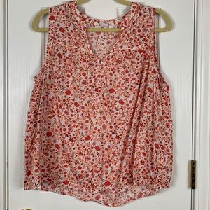 Gap orange and white flowered sleeveless top size large. V neckline.
